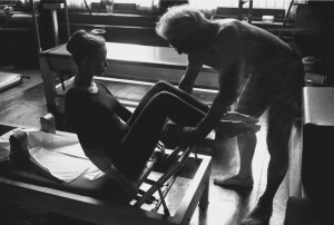 PLATE 26A student on reformer